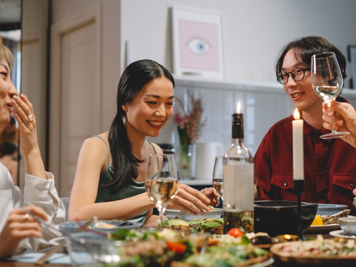 Guests relaxing and laughing at a party