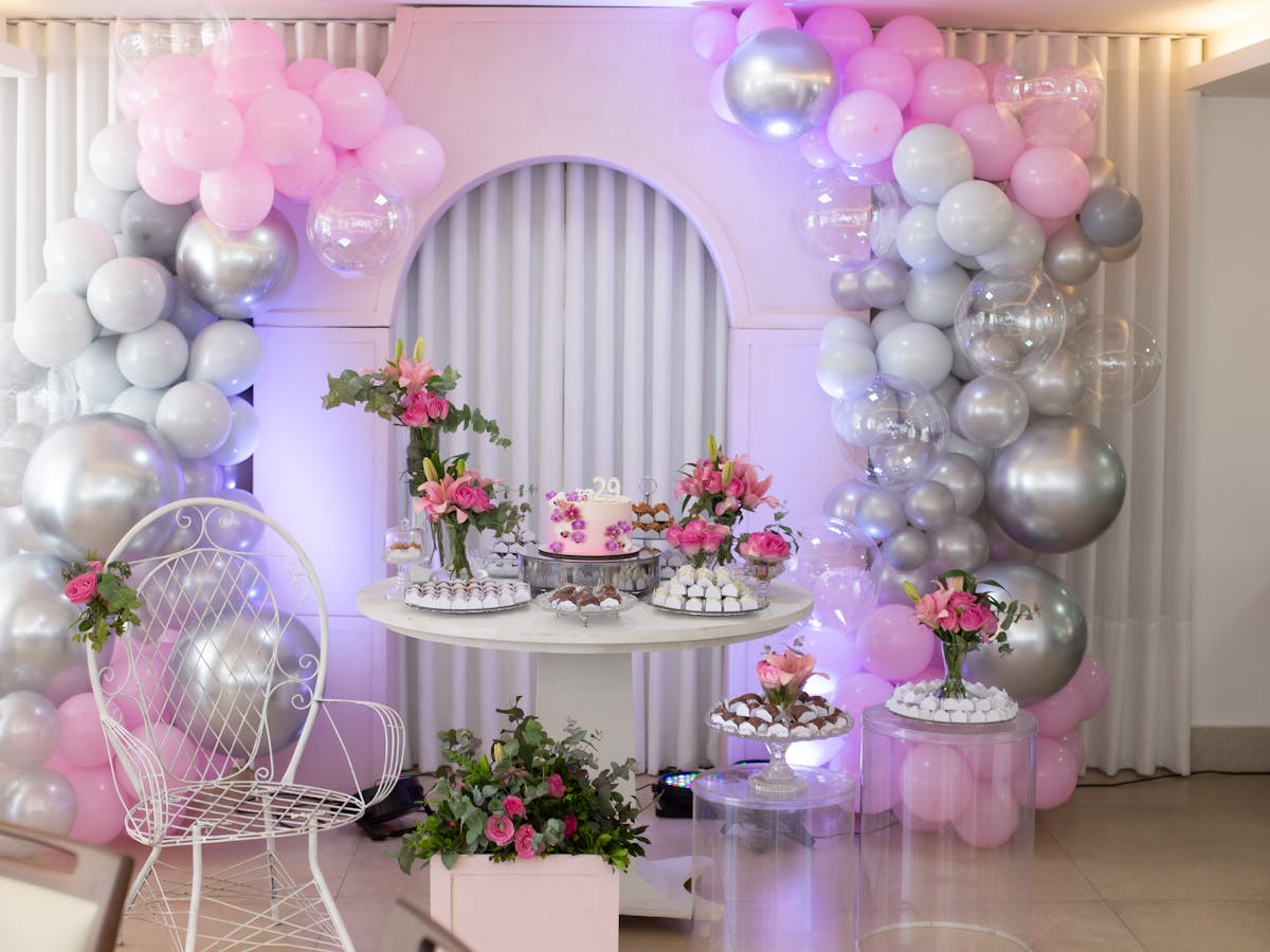 Balloon garland and decor setup