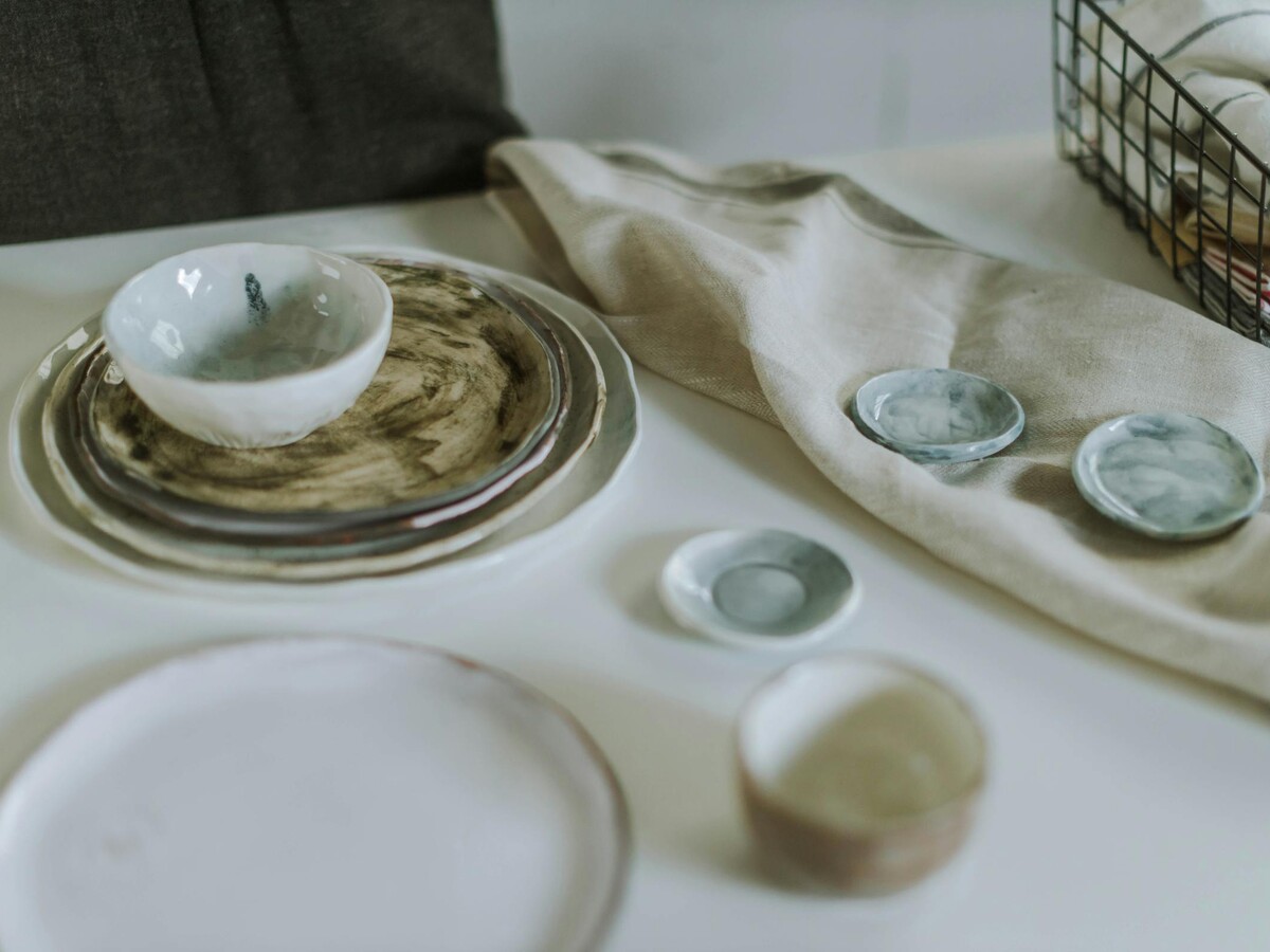 Neutral place setting with linen and glassware